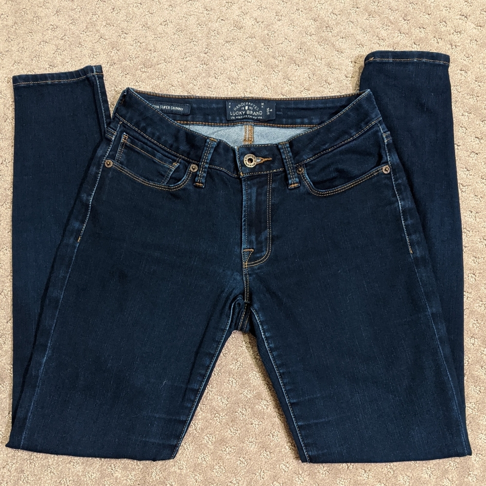 2/$9 Lucky Brand dark blue skinny jeans
